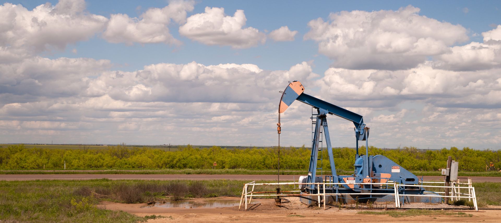 Oil pumpjack in a field